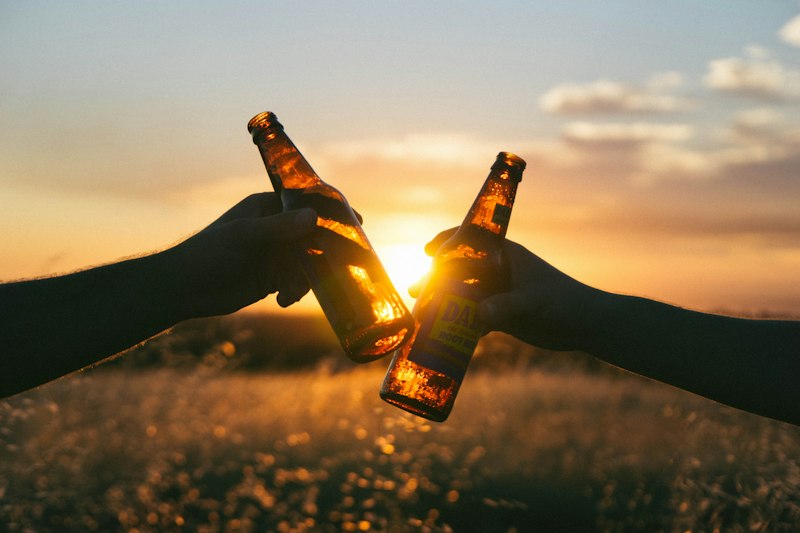 Friends cheers with beers